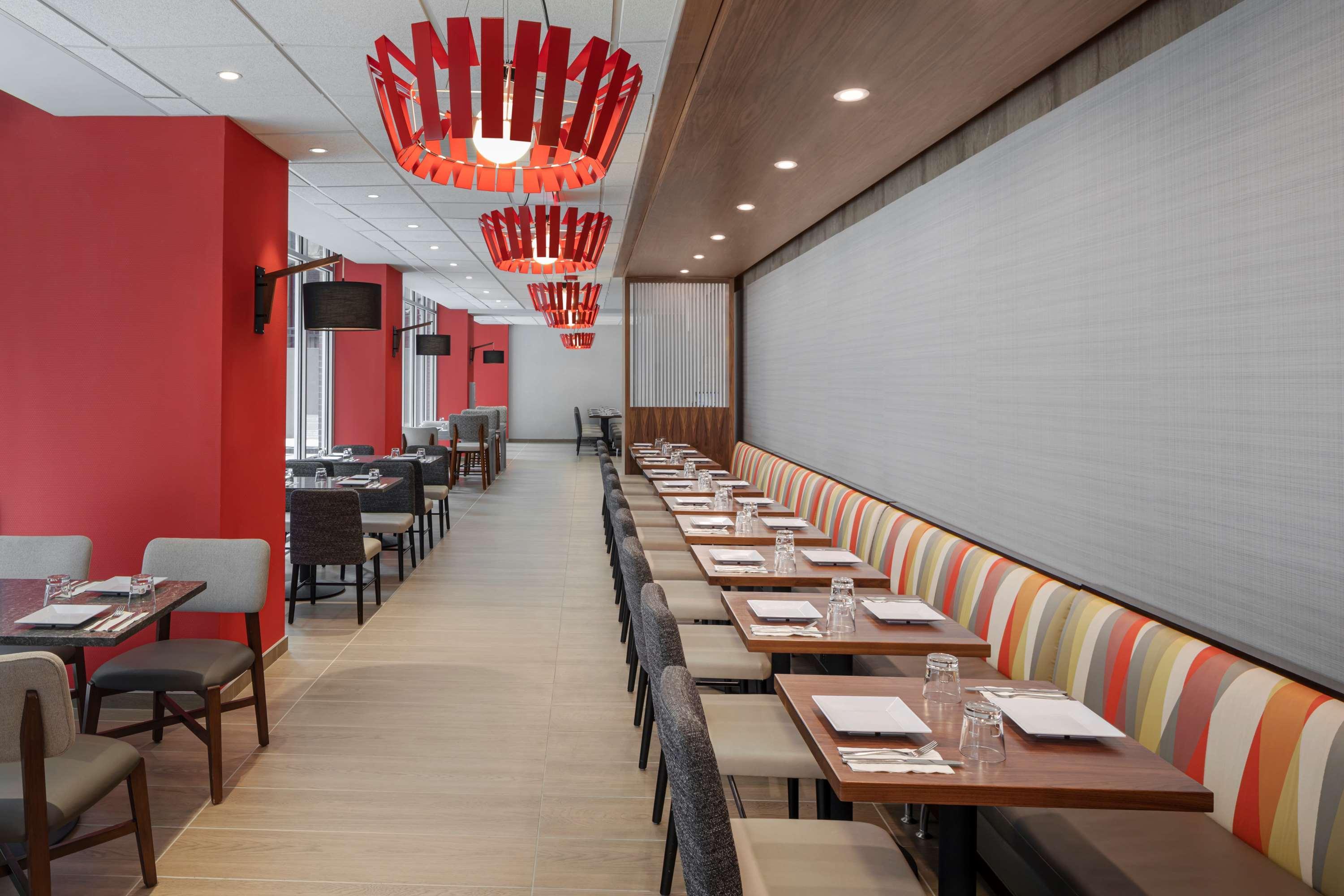 Hyatt Place New York Chelsea Exterior photo Interior of a modern restaurant