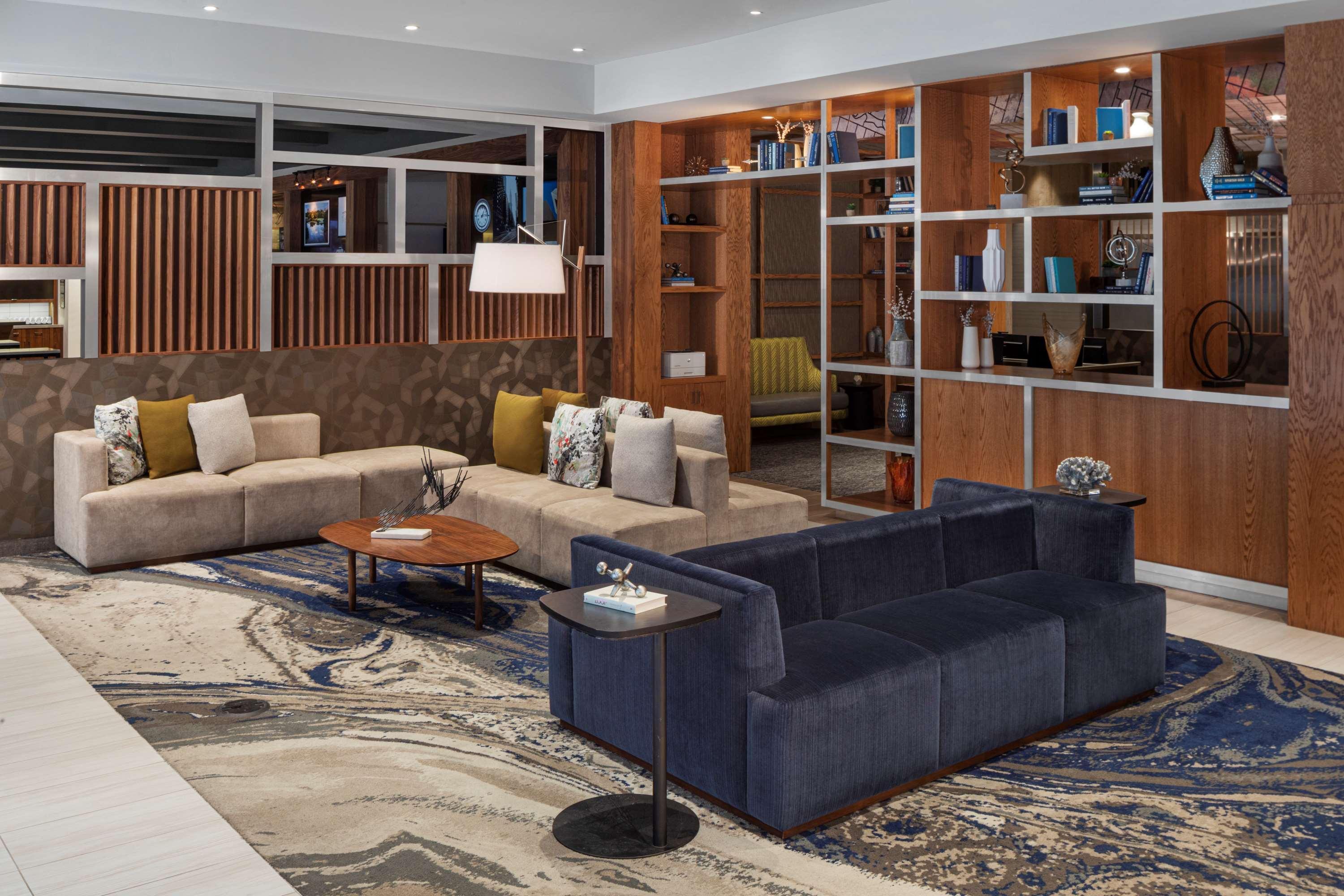 Hyatt Place New York Chelsea Exterior photo Interior design of a modern hotel lobby